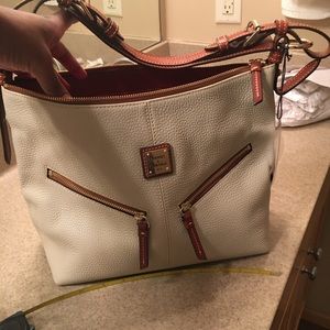 Dooney & Bourke leather hobo style.Removable strap